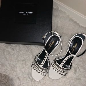 Selling a brand new YSL white heels.